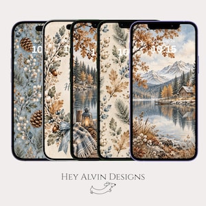 May include: Five smartphones displayed side-by-side, each showcasing a different digital wallpaper featuring autumn-themed illustrations of pinecones, foliage, a cosy cabin by a lake, and a lantern, with the text Hey Alvin Designs below.