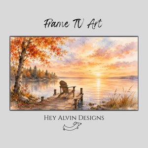 May include: A digital print titled Frame TV Art by Hey Alvin Designs featuring a watercolour landscape of a wooden dock with an Adirondack chair extending into a lake at sunset, with orange autumn trees and a soft, glowing sky above the water.