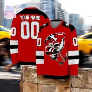 Personalized Devils ice hockey jersey with Mickey Mouse design. Custom fan jersey for Jack and Luke Hughes supporters.