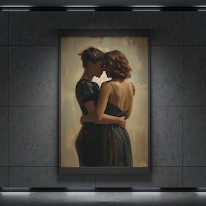May include: A framed artwork showing two women in an embrace. One wears a dark dress with short sleeves, the other a dress with spaghetti straps. The painting has a warm colour palette, with the women's hair in dark and auburn tones.