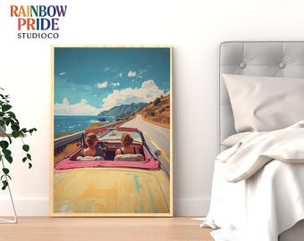May include: A framed art print featuring a yellow convertible with two people driving along a coastal road. The sky is blue with white clouds, and the ocean is visible. The print has the text "RAINBOW PRIDE STUDIOCO" in the upper left corner.