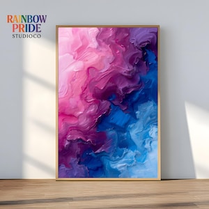 Könnte beinhalten: Abstrakter Kunstdruck mit einer lebendigen Farbmischung. Das Kunstwerk zeigt eine dynamische Komposition aus rosa, lila und blauen Farbtönen, die einen strukturierten Pinselstrich-Effekt erzeugt. Das gerahmte Stück wird vor einer weißen Wand und einem Holzboden mit dem Text "RAINBOW PRIDE STUDIOCO" präsentiert.