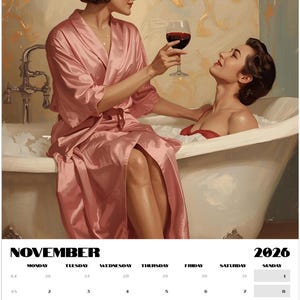 May include: A calendar page for November 2026 featuring an illustration of two women. One woman, in a pink robe, offers a glass of red wine to another woman in a bathtub. The background has a gold floral design.