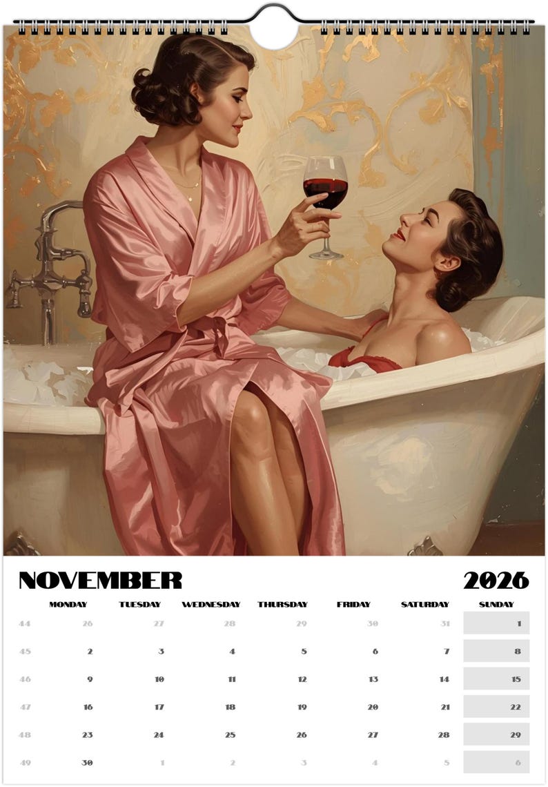 May include: A calendar page for November 2026 featuring an illustration of two women. One woman, in a pink robe, offers a glass of red wine to another woman in a bathtub. The background has a gold floral design.