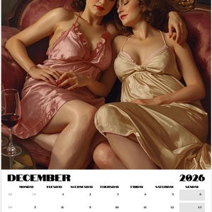 May include: A calendar page for December 2026 featuring an artistic depiction of two women in silk lingerie, seated on a pink sofa. One wears a pink slip, the other a cream-colored slip. A glass of red wine is visible. The calendar grid is at the bottom.