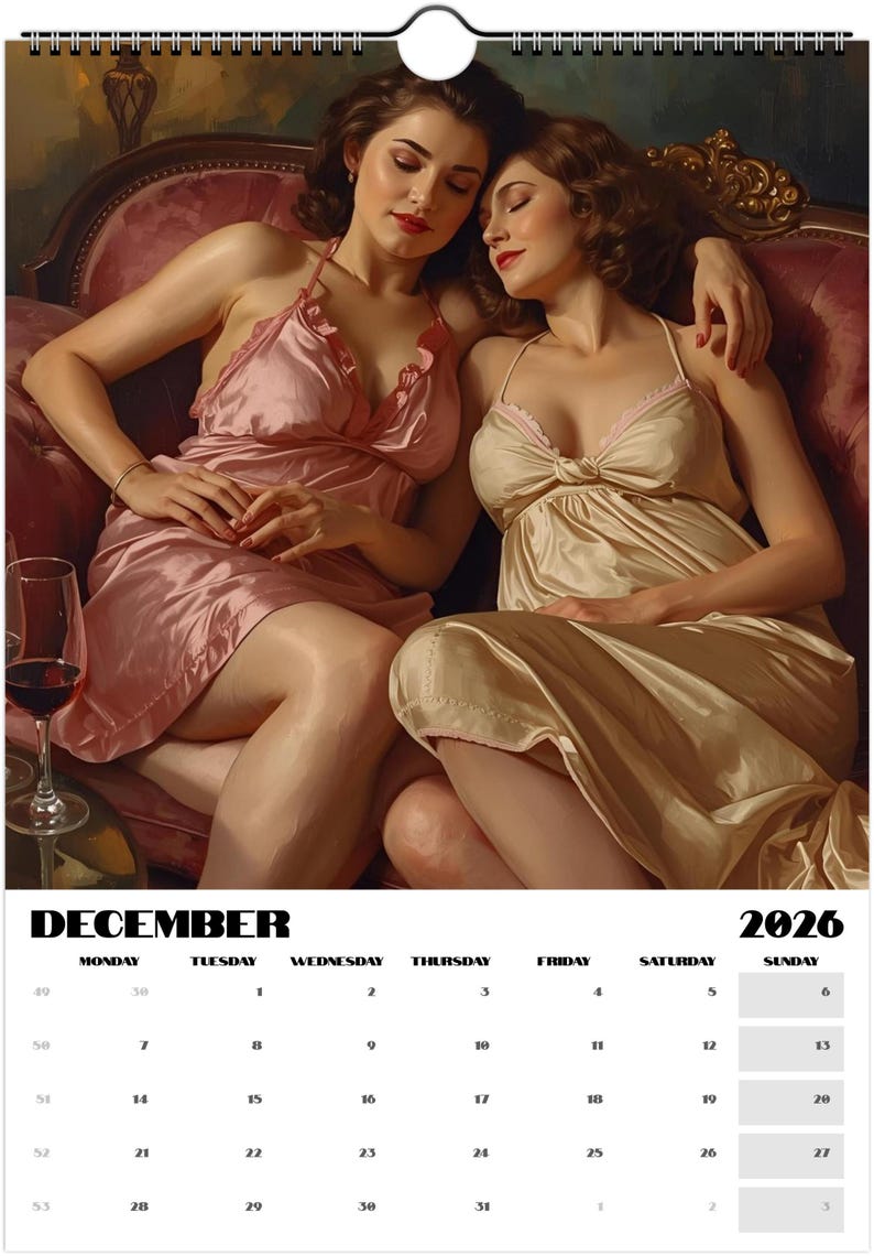 May include: A calendar page for December 2026 featuring an artistic depiction of two women in silk lingerie, seated on a pink sofa. One wears a pink slip, the other a cream-colored slip. A glass of red wine is visible. The calendar grid is at the bottom.