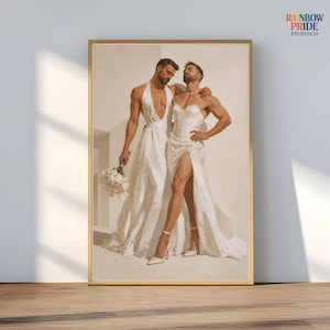 Könnte beinhalten: Gerahmter Druck mit zwei Figuren in weißen Kleidern. Eine hält einen Strauß weißer Blumen. Die andere hat einen Arm um die erste. Der Druck hat einen goldenen Rahmen und den Text "RAINBOW PRIDE STUDIOCO" oben rechts.