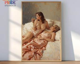 May include: A framed art print depicting two figures in a bedroom. One holds a glass of amber liquid, the other reclines. Both are wearing pink lingerie. The artwork has a vintage aesthetic, with a soft, painterly style.