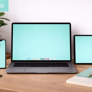 May include: A modern workspace setup featuring a laptop, tablet, and smartphone with matching light blue screens. A coffee mug, plant, and notebooks are also on the wooden desk. The phone displays 9:41.