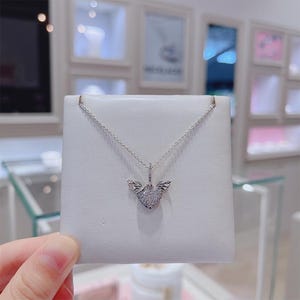 May include: A rustic wooden sign with the text "Welcome to our home" in a handwritten style. The sign is rectangular, with a distressed finish, and features a simple, inviting design. It's suitable for indoor or outdoor use.