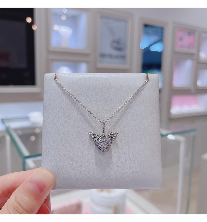 May include: A rustic wooden sign with the text "Welcome to our home" in a handwritten style. The sign is rectangular, with a distressed finish, and features a simple, inviting design. It's suitable for indoor or outdoor use.