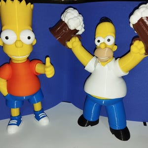 Homer Simpson/Bart Simpson. Simpsons cartoon character figurines.