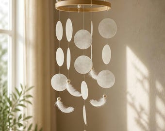 WHITE WHISPER Wind Chime - shimmering mobile made of white shell discs and feathers