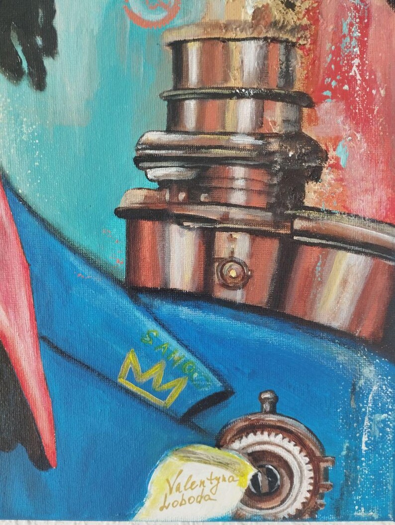 May include: An abstract painting with a blue jacket featuring a gold crown and the word "SANGS". The painting has a steampunk-inspired element with metallic brown gears and a cylindrical structure. The artist's signature, "Valentyna Loboda", is visible.