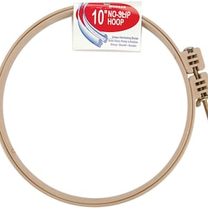 May include: A 10 inch beige embroidery hoop with a no-slip design. The hoop is made of plastic and has a metal screw to tighten it. The packaging says "10" NO-SLIP HOOP" and "Unique Interlocking Design Holds Fabric Firmly in Position Strong Smooth Durable".