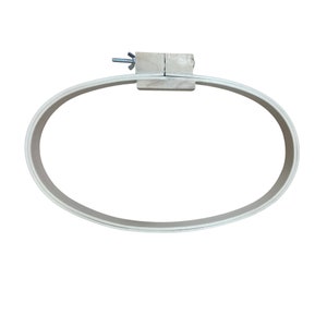 May include: A wooden oval embroidery hoop with a screw-tightening mechanism. The hoop is made of natural wood and has a smooth finish.