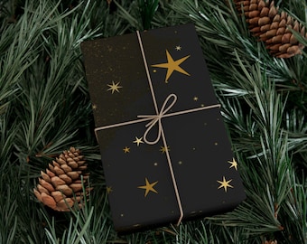 Papel de regalo con estrellas negras y doradas, papel de regalo celestial de lujo, elegantes hojas de papel de regalo para fiestas y cumpleaños.
