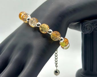 Handmade glass bead bracelet, Orange and Yellow Glass Beads, Statement Jewelry, Sterling Silver Spacers