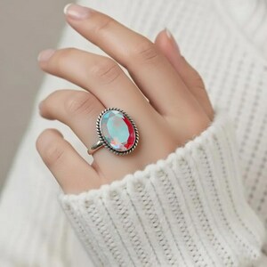 Luxury Mystic Topaz Ring - Solid Sterling Silver Bezel Setting with Twisted Rope Border - Genuine Oval Multi-Tone Crystal Ring - Hand Finished Fine Jewelry for Women - Exclusive Designer Style - Gift for Her - Mother's Day, Anniversary, Birthday - Unique and Powerful Statement Piece - Natural Stone Beauty with Iridescent Coating - Adjustable or Standard Size Available - Ready to Gift - Elevate Your Collection with This Rare and Captivating Gem