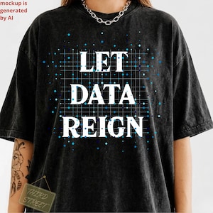 May include: A charcoal black mineral-washed t-shirt featuring the white text LET DATA REIGN centred on the chest. The design includes a blue grid pattern with scattered blue dots of varying sizes layered behind the bold white lettering.