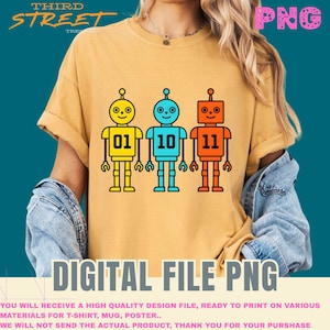 Peut inclure: T-shirt jaune moutarde avec trois robots de dessin animé jaunes, bleus et oranges. Chaque robot porte un numéro : 01, 10 et 11. Les mots "DIGITAL FILE PNG" sont en bas. Le t-shirt est un fichier numérique.