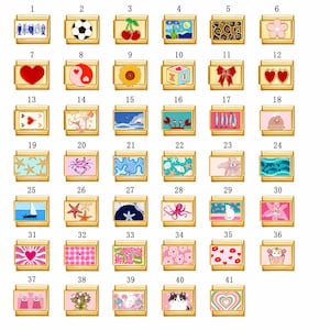 May include: A collection of gold-toned charm bracelets with various designs. The charms feature images such as a soccer ball, cherries, a sunflower, a heart, a crab, a sailboat, and a cat. The charms are rectangular with a gold border.