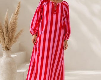 Elegant long-sleeved dress flatters your figure for evenings and holidays