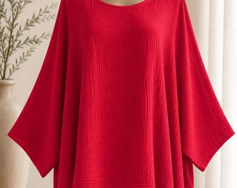 Top monocromático de manga murciélago y corte holgado para mujer, un look veraniego a la moda para un estilo casual de diario.