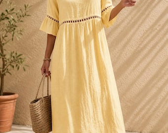 Vestido trapecio de mujer en algodón y lino calado para un verano bohemio y elegante.