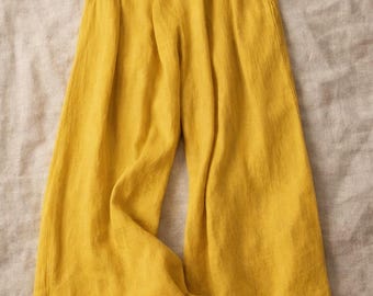 Pantalon femme été coupe large taille élastique avec poches style élégant décontracté