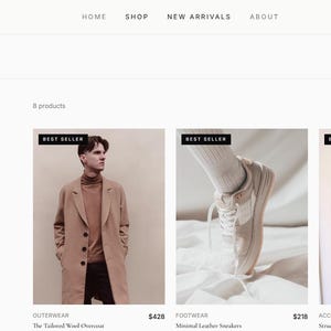 May include: A website interface for Maison featuring a shop page with three product listings: a tan wool overcoat, a white leather sneaker, and a brown leather tote bag. Each item is labeled as a best seller with prices listed in US dollars.