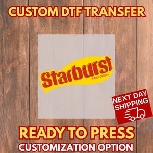May include: A DTF transfer featuring the Starburst logo in red and yellow. The words "CUSTOM DTF TRANSFER", "READY TO PRESS", and "CUSTOMIZATION OPTION" are printed in red. A red square with the words "NEXT DAY SHIPPING" and a truck icon is also visible.