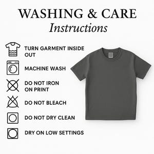 May include: A dark gray t-shirt accompanied by a list of washing and care instructions. The text reads: WASHING & CARE Instructions, TURN GARMENT INSIDE OUT, MACHINE WASH, DO NOT IRON ON PRINT, DO NOT BLEACH, DO NOT DRY CLEAN, DRY ON LOW SETTINGS.