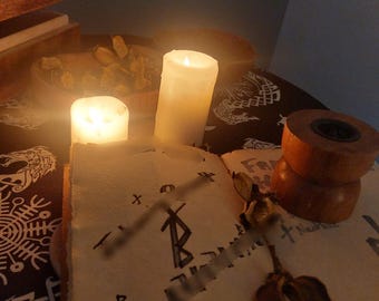 May include: A dimly lit scene featuring an open book with handwritten symbols, a dried rose, and three lit candles. A wooden object and a bowl of dried herbs are also present. The image suggests a mystical or spiritual setting, with a focus on ancient knowledge.