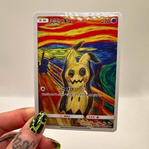 May include: A Pok&eacute;mon trading card featuring Mimikyu in a parody of Edvard Munch's "The Scream." The card has Japanese text and a colorful, expressive background with a yellow and black Mimikyu character.