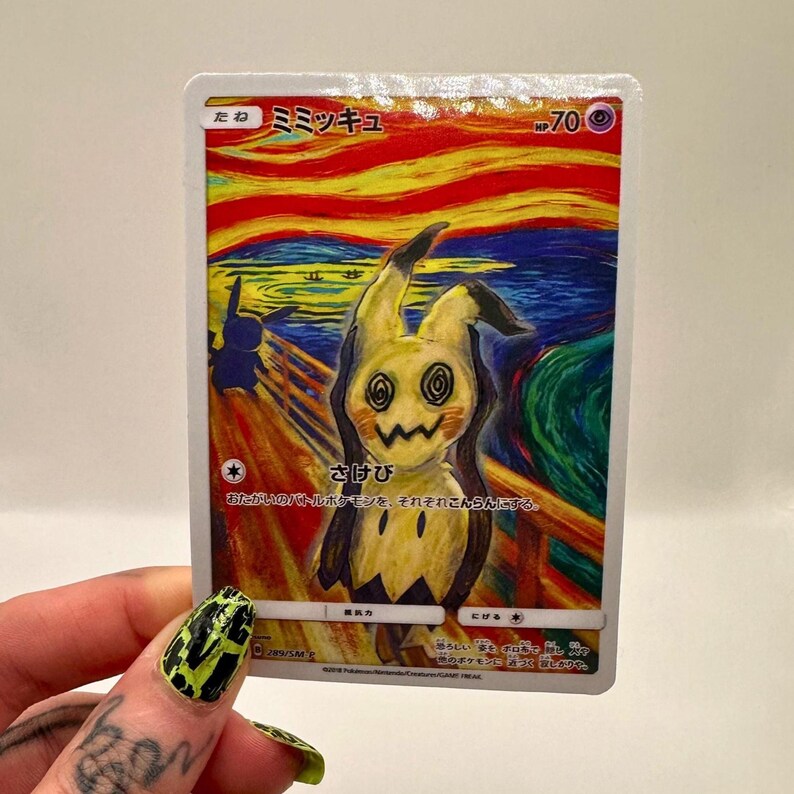 May include: A Pok&eacute;mon trading card featuring Mimikyu in a parody of Edvard Munch's "The Scream." The card has Japanese text and a colorful, expressive background with a yellow and black Mimikyu character.