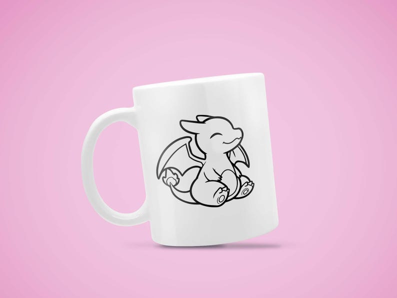 May include: White ceramic mug featuring a black outline illustration of a smiling cartoon dragon with wings. The dragon is sitting with its legs crossed. The mug has a curved handle and is set against a pink background.