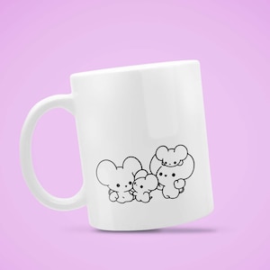 May include: White ceramic mug featuring a black and white illustration of three cartoon mice. The mice are in a group, with one mouse on top of another. The mug has a curved handle and is set against a light purple background.