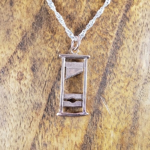 Bronze Guillotine Pendant