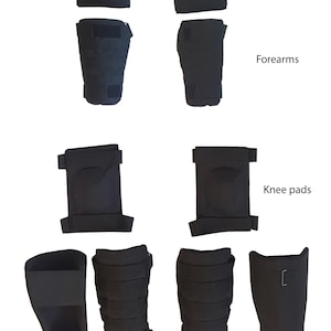 May include: Black protective gear set including elbow pads, forearm guards, knee pads, and all-round shin guards. Each item features a secure strap design for a snug fit. The image displays the protective gear against a white background.