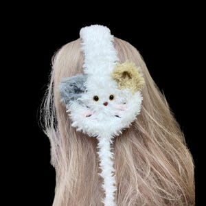 Protetores de orelhas de gato personalizados e aconchegantes, acessório de pelúcia feito à mão.