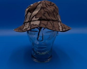 Sombrero de pescador con camuflaje TREBARK de Mossy Oak, fabricado en EE. UU., talla pequeña, para caza al aire libre.