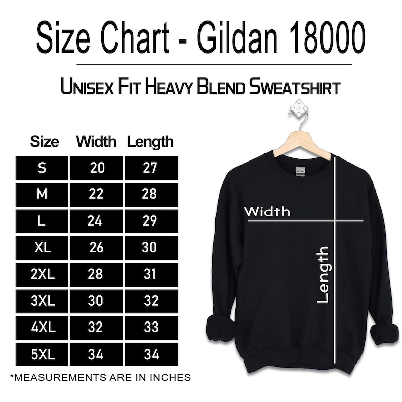 May include: A black Gildan 18000 unisex heavy blend sweatshirt on a hanger next to a size chart. The chart lists sizes S through 5XL with corresponding width and length measurements in inches. The sweatshirt features white lines indicating width and length.