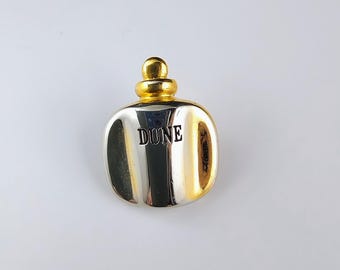 Frasco de perfume Christian Dior Dune vintage, alfiler dorado