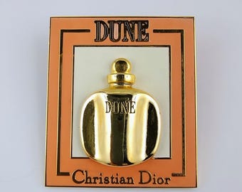 Broche de perfume vintage Dune de Christian Dior