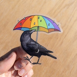Rainy Day Crow 3" clear vinyl sticker - waterproof/dishwasher safe/fade resistant