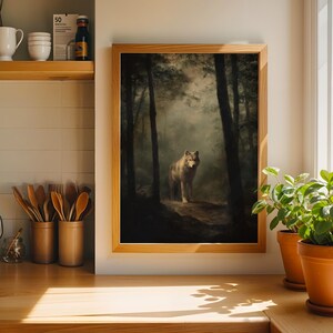 Wolf painting showing a lone gray wolf standing on a forest path surrounded by tall trees and soft fog, rendered in a muted, painterly style. This forest animal art blends dark academia art and moody landscape tones with cottagecore painting influence, creating a calm woodland atmosphere suited for boho woodland prints, rustic lodge art, cabin wall art, and forest art print collections.