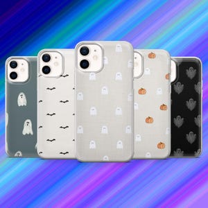May include: Five phone cases with Halloween designs. The cases display patterns of white ghosts, bats, and pumpkins on backgrounds of grey, off-white, and black. The cases are arranged in a row against a blue and purple gradient.