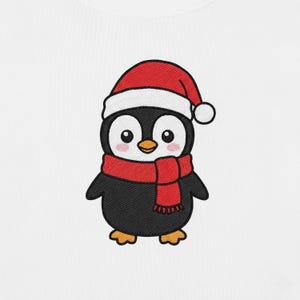May include: Embroidered image of a cartoon penguin wearing a red Santa hat and scarf. The penguin is black with a white belly, a yellow beak, and orange feet. The hat has a white trim and a white pom-pom. The scarf is red.