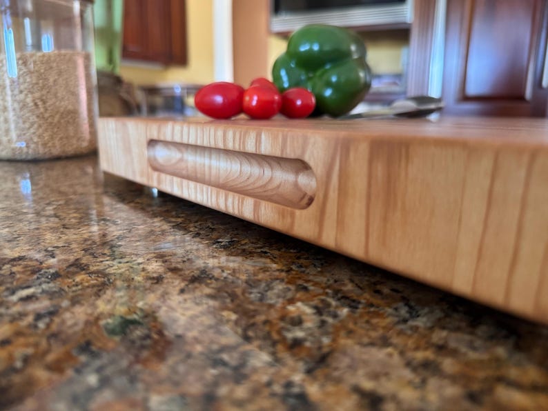 Premium heavy end grain maple butcher block cutting board, full board view highlighting the clean maple pattern, square edges, and smooth finish.